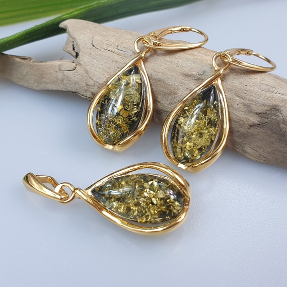 Amber earrings set in gold deals