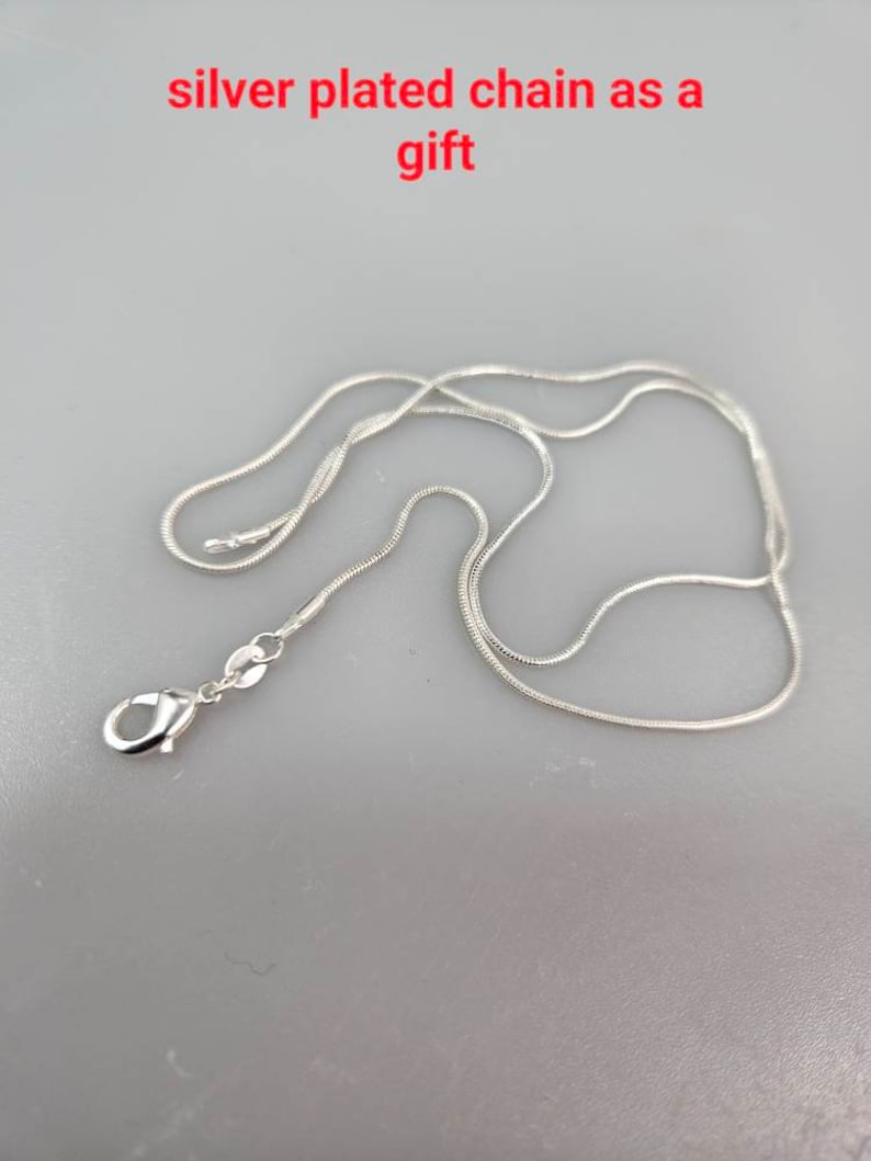 Sterling silver baltisk bärnsten flammande solhänge solcellsdrivet bild 10