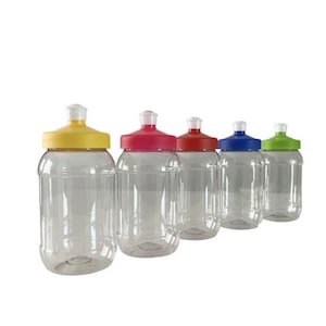 May include: Five clear plastic bottles with different colored lids. The lids are yellow, red, blue, green, and light green.
