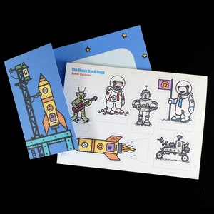 Card with cut-out cartoon figures