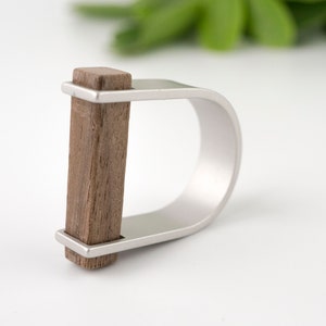 Contemporary fashion Walnut wooden bar ring, made of walnut wood and an aluminium band, unisex fashion. image 2