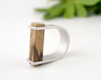 Minimalist wood bar ring, made of anodized aluminium and walnut wood can be a perfect gift.