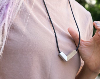 Unique light wood playful asymmetric necklace, one of a kind and can be a perfect gift.