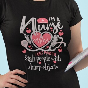I'm A Nurse I Get Paid To Stab People With Sharp Objects Funny Nurse T-Shirt - Nurses Day Gift - RN Shirt