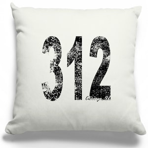 May include: White throw pillow with black distressed text that reads "312 Chicago, IL".