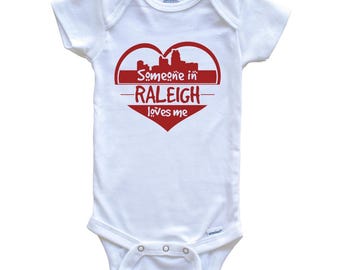 Someone in Raleigh Loves Me Raleigh North Carolina Skyline Heart   Baby Bodysuit