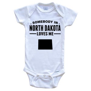 Somebody In North Dakota Loves Me   Baby Bodysuit - North Dakota Baby Bodysuit