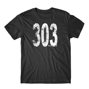 May include: Black t-shirt with a distressed white graphic of the numbers "303" and the text "Denver, CO" below. The shirt has a crew neck and short sleeves. The graphic has a vintage, worn look.