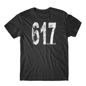 May include: Black t-shirt with a white distressed graphic of the number 617 and the text "Boston, MA".