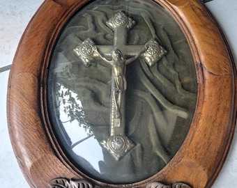 Vintage French Jesus on crucifix cross set in oval glass wooden frame