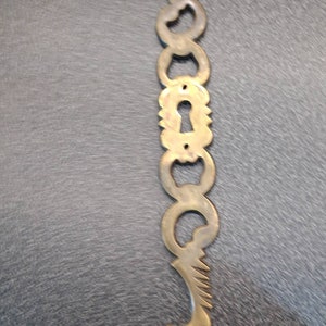 Vintage French cupboard door key hole escutching