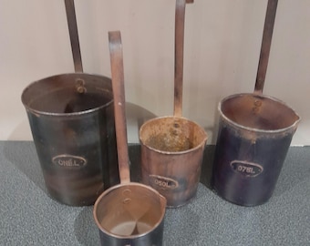 Vintage French set of 4 measuring cups