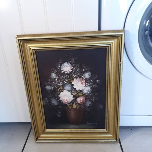 Painting of Flowers in shops a vase against a black background
