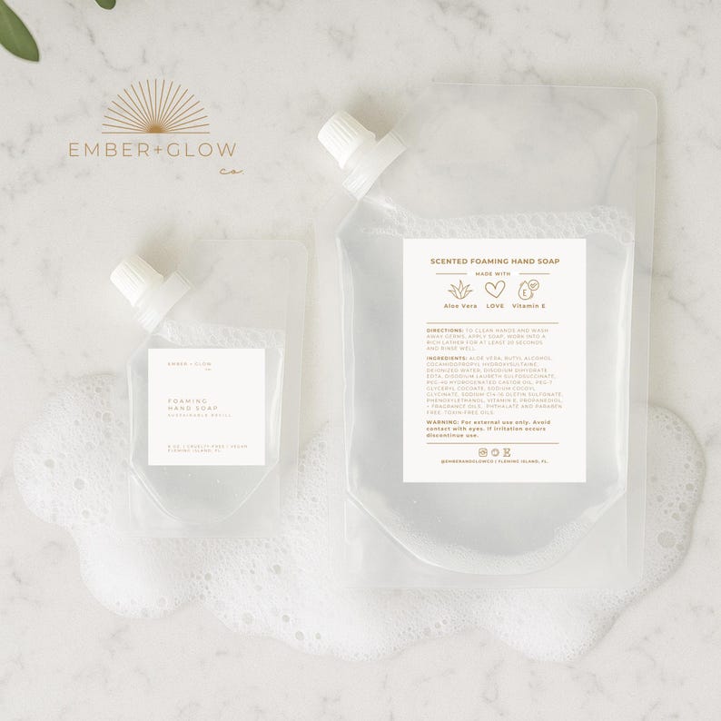 May include: Two clear plastic pouches of scented foaming hand soap with white spouts. The larger pouch has a label with product information and the words "Scented Foaming Hand Soap". The smaller pouch has a label with the words "Foaming Hand Soap".
