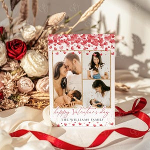 May include: A Valentine's Day card featuring a family photo collage with red heart accents. The card includes the text "happy Valentine's day" and "THE WILLIAMS FAMILY". A red ribbon and floral arrangement are in the background.