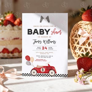 May include: A baby shower invitation with a race car theme. The invitation features the text "Race on over for a Baby Shower" and details for the event. A red race car with the number 1 is at the bottom, with balloons.