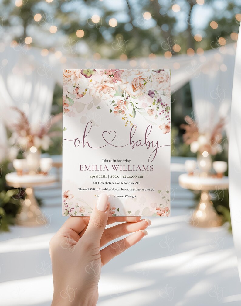 May include: A baby shower invitation with a floral design and the text "oh baby" in pink and purple. The invitation includes the name "Emilia Williams", the date "April 22th", and the time "10:00 am".