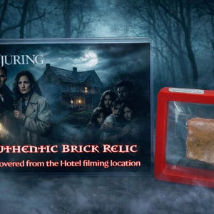 May include: A promotional image for the film "The Conjuring", with a poster and an "Authentic Brick Relic" from the hotel filming location. The brick is in a red display case. The poster shows the film's cast and a haunted house.