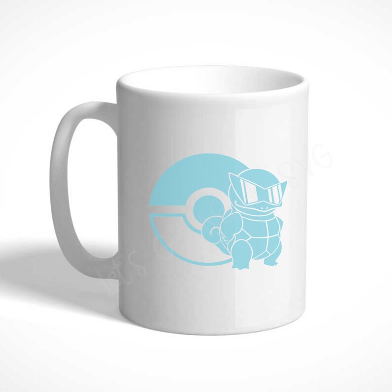 May include: White ceramic coffee mug with a blue silhouette of a Pokemon character wearing sunglasses and a Pokeball.