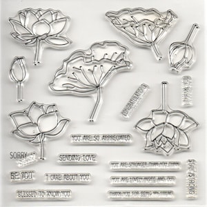 May include: Clear stamp set with images of lotus flowers and leaves, and phrases like "Congratulations", "You are so appreciated", "Sending love", "Be you", "I care about you", "Blessed to know you", "You are stronger than you think", "You are lovely inside and out", "Thank you for being my friend", "Stay strong", "Thank you", and "Sorry".