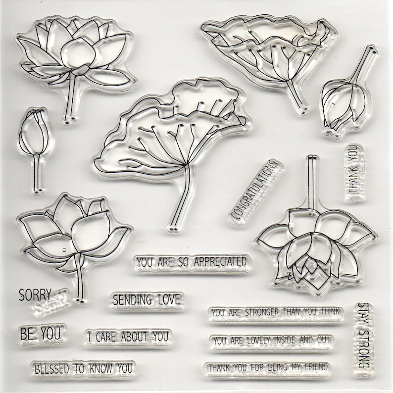 May include: Clear stamp set with images of lotus flowers and leaves, and phrases like "Congratulations", "You are so appreciated", "Sending love", "Be you", "I care about you", "Blessed to know you", "You are stronger than you think", "You are lovely inside and out", "Thank you for being my friend", "Stay strong", "Thank you", and "Sorry".
