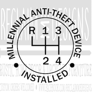 May include: Black and white sticker with the text "Millennial Anti-theft Device Installed" in a circle around a gear shift pattern with the letters R, 1, 2, 3, 4.
