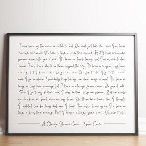 K&ouml;nnte beinhalten: Ein schwarz-wei&szlig;er druckbarer Wandkunstdruck mit den Texten des Songs "A Change Gonna Come" von Sam Cooke. Die Texte sind in einer handschriftlichen Schriftart geschrieben.