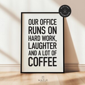 May include: Black framed print with the text "OUR OFFICE RUNS ON HARD WORK, LAUGHTER AND A LOT OF COFFEE." A digital download icon is in the upper right corner. The Maple Printables logo is at the bottom.