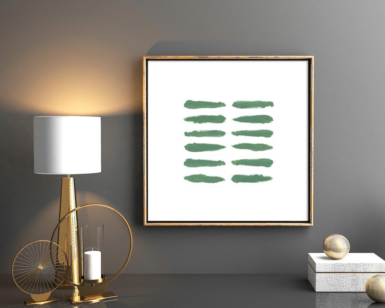 May include: A framed abstract print with a white background and a series of horizontal green brushstrokes.