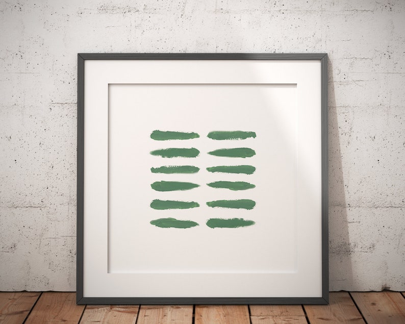 May include: A framed print with a minimalist design featuring a series of horizontal green brushstrokes on a white background.