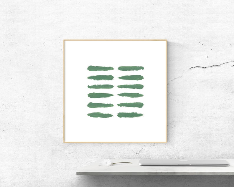 May include: A framed print with a minimalist design featuring a series of horizontal green brushstrokes on a white background.
