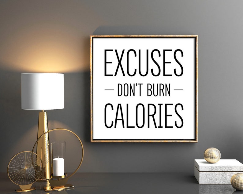 May include: A motivational quote print with a gold frame. The quote reads "Excuses - Don't Burn - Calories".