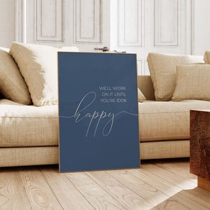May include: A blue poster with white text that reads "We'll work on it until you're 100% happy".
