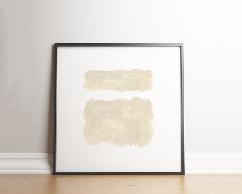 May include: A framed abstract art print with two beige brushstrokes on a white background.