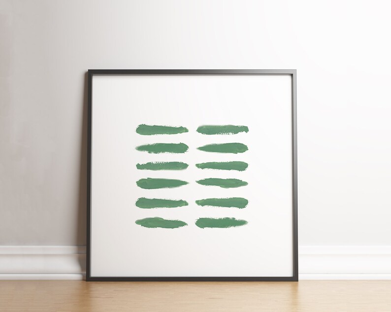 May include: A framed print with a minimalist design featuring a series of horizontal green brushstrokes on a white background.