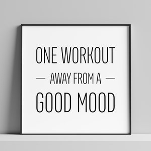 May include: Black and white motivational quote poster with the text "ONE WORKOUT AWAY FROM A GOOD MOOD" in a black frame.