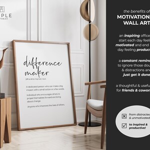 May include: A framed print with the text "difference maker" in a minimalist style. The definition of "difference maker" is included below the title. The print is displayed in a well-lit room with a wooden side table and a decorative bird sculpture.