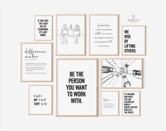 May include: A collection of framed art prints with motivational quotes and line drawings. The prints feature phrases like "Be the person you want to work with" and "We rise by lifting others." The frames are a light wood color.