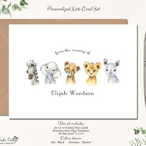 May include: A personalized note card set featuring watercolor illustrations of a zebra, elephant, cheetah, lion, and rhino. The text "from the nursery of Elijah Woodson" is displayed. The set includes 10 folded note cards and premium envelopes.