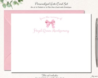 May include: Personalized note card set with a pink bow and the text "from the nursery of Hazel Grace Montgomery". The set includes 10 folded or 12 flat note cards with envelopes. The cards are 4.25 inches by 5.5 inches.