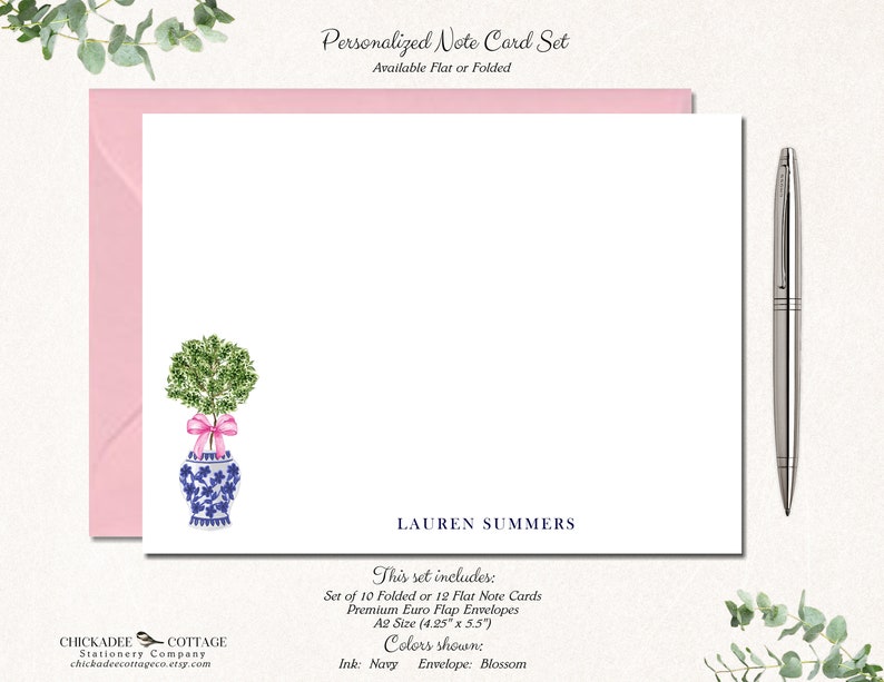 May include: Personalized note card set with a blue and white floral design. The set includes 10 folded or 12 flat note cards and premium Euro flap envelopes. The cards are A2 size (4.25" x 5.5"). The ink color is navy and the envelope color is blossom.