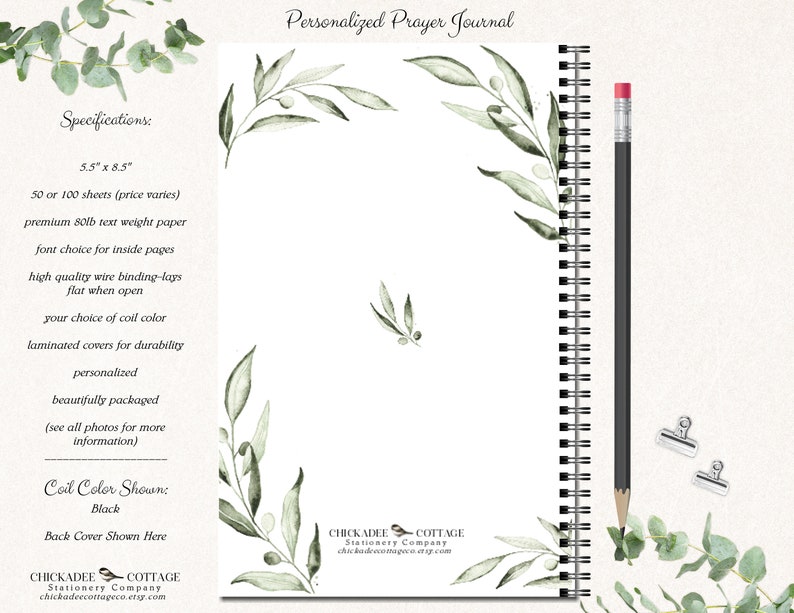 May include: A personalized prayer journal with a black coil binding and a watercolor design of olive branches. The journal is 5.5 inches by 8.5 inches and has 50 or 100 sheets of 80lb text weight paper. The journal is available in a variety of font choices and coil colors.