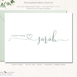 May include: A set of personalized note cards with a powder green envelope. The white card features the text "A NOTE FROM" and a name in forest green script. The card set includes 10 folded cards, each measuring 4.25" x 5.5".