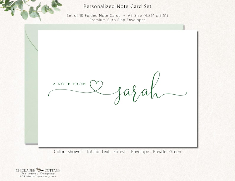 May include: A set of personalized note cards with a powder green envelope. The white card features the text "A NOTE FROM" and a name in forest green script. The card set includes 10 folded cards, each measuring 4.25" x 5.5".