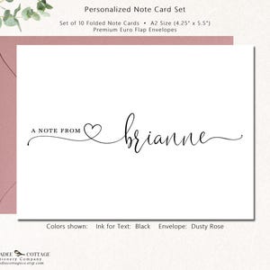 May include: A personalized note card set with a white card and a dusty rose envelope. The card features the text "A note from" followed by a heart and the name "brianne" in black script. The set includes 10 folded cards, each 4.25" x 5.5".