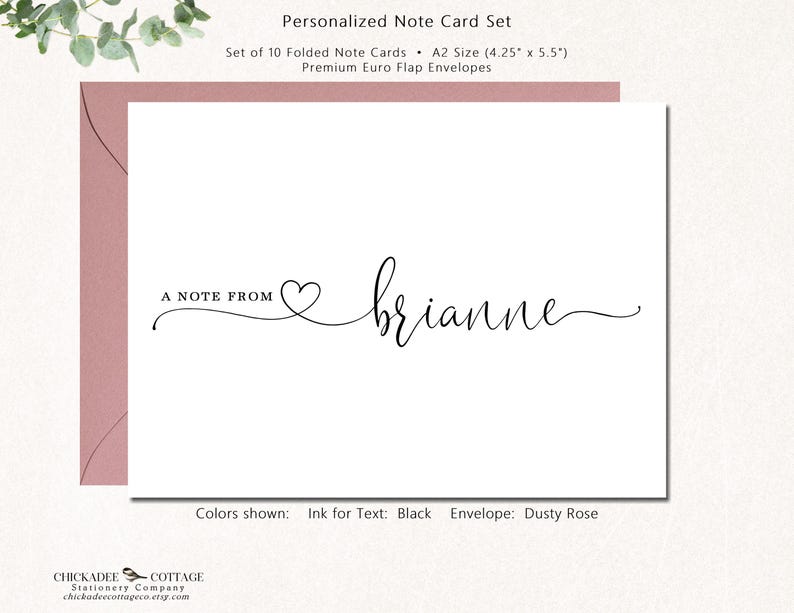 May include: A personalized note card set with a white card and a dusty rose envelope. The card features the text "A note from" followed by a heart and the name "brianne" in black script. The set includes 10 folded cards, each 4.25" x 5.5".