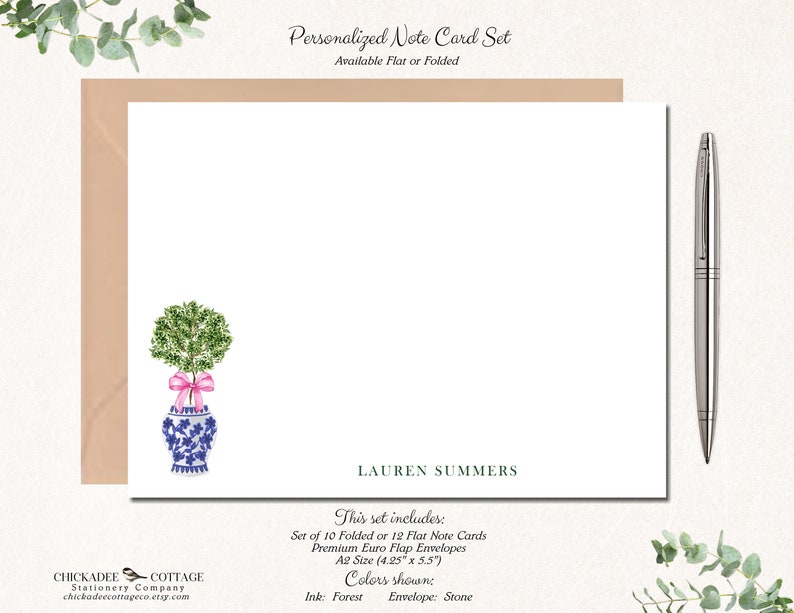 May include: Personalized note card set with a blue and white floral design. The set includes 10 folded or 12 flat note cards and premium Euro flap envelopes. The cards are 4.25 inches by 5.5 inches. The ink color is forest and the envelope color is stone.