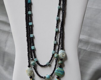3 Chain blue and black beaded necklace