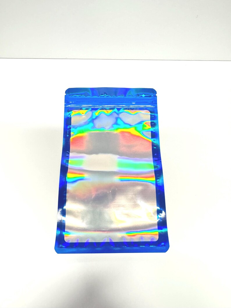 May include: A blue iridescent resealable pouch with a clear window. The pouch is made of a durable, waterproof material and is perfect for storing small items.