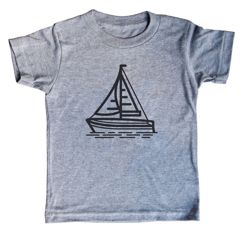 May include: A heather grey t-shirt with a black sailboat graphic.